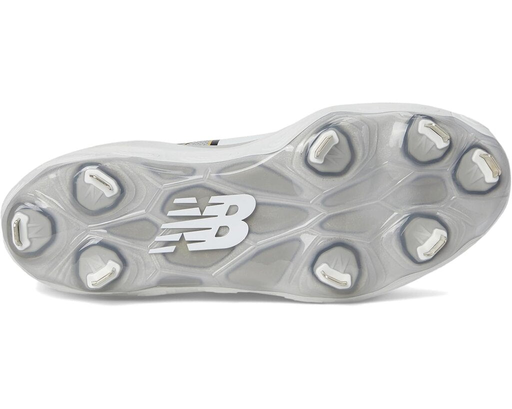Grey metal baseball cleat outsole with metal studs and New Balance logo