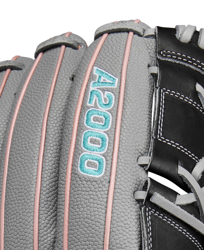 Close-up of embroidered "A2000" on grey glove back with pink stitching and black trim