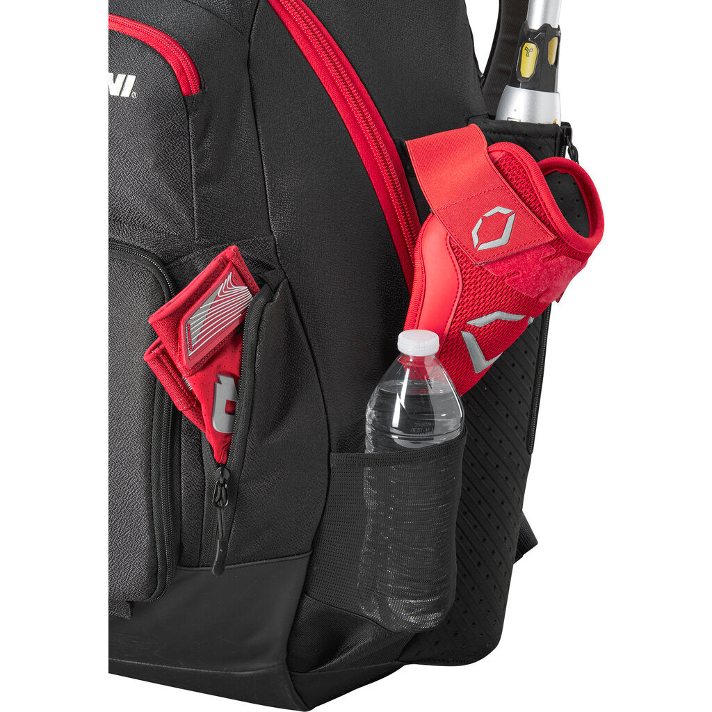Black backpack bat bag with red padded straps and front pocket