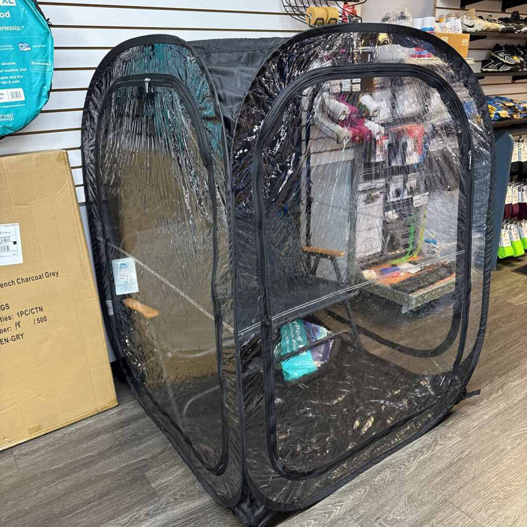 Black pop-up weather pod tent with two arched side panels and front mesh windows
