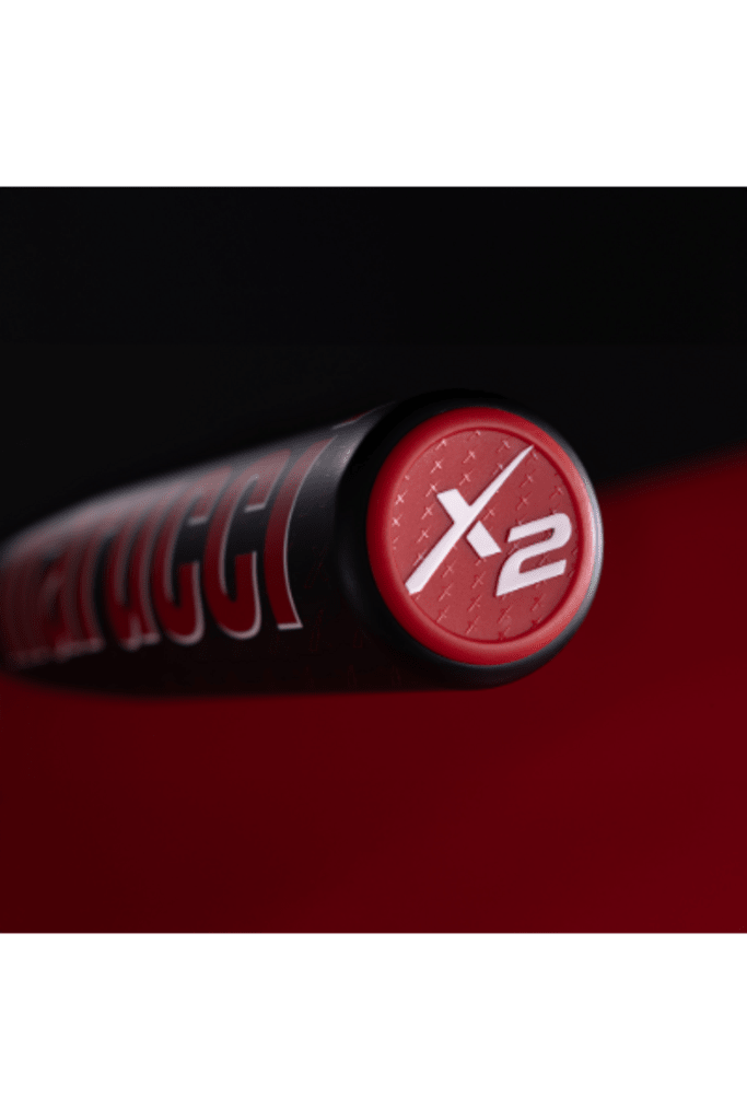 Red X2 end cap on black baseball bat handle and barrel detail