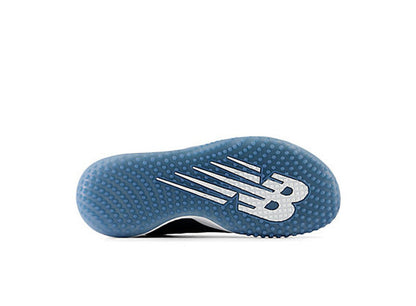 Women's turf shoe outsole in blue, textured traction with large New Balance logo