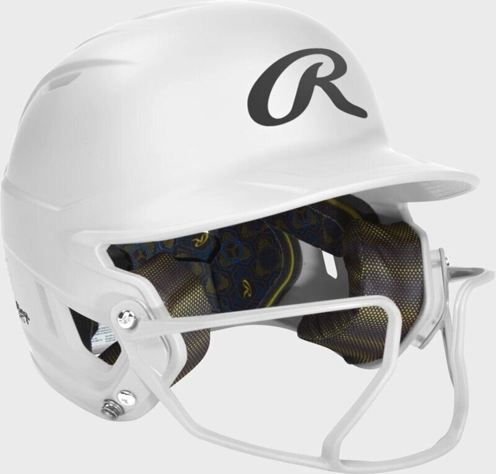 Rawlings white fastpitch batting helmet with side profile and face guard