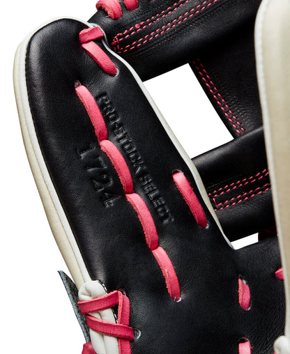 Wilson A2K baseball glove close-up, black leather with pink stitching and lace details.
