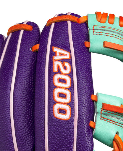 Baseball glove close-up with orange A2000 patch on purple web trim and orange laces