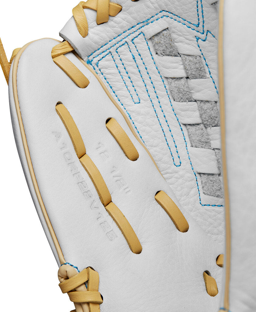 Close-up of white glove panel with light-blue stitching and tan finger hooks
