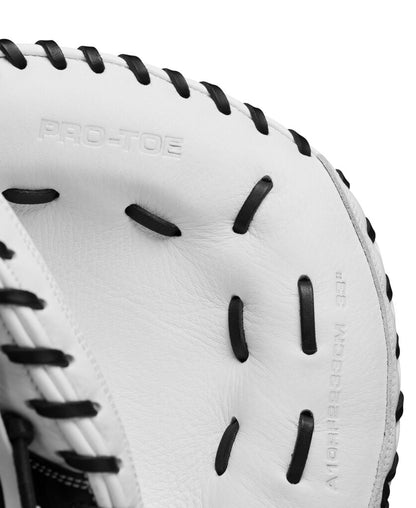 Close-up of white leather glove palm with PRO-TYPE embossing and finger holes.