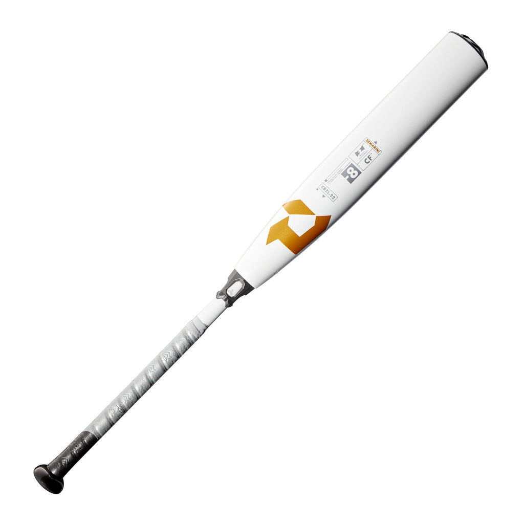 White baseball bat with gold emblem and black cap, showing barrel branding.