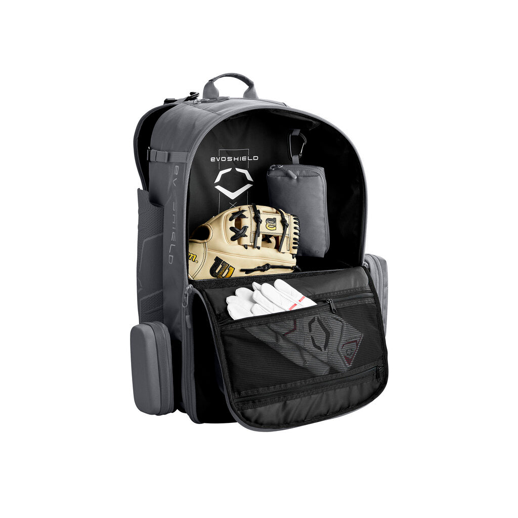 Black backpack bat bag with open interior showing storage pockets for gear.