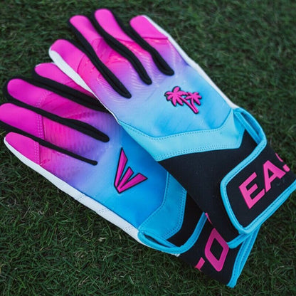 Adult batting gloves in aqua with pink accents and black knuckle guards, padded palm