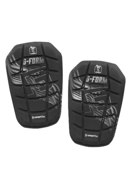 Pair of black soccer shin guards with hard shell and Smartflex graphic panels