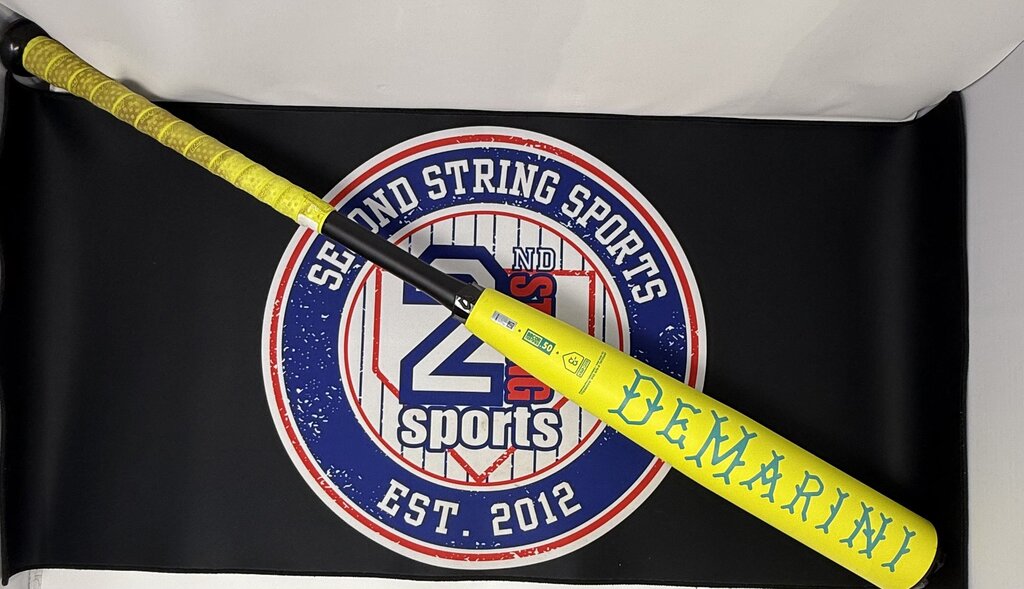 Yellow baseball bat with green/teal LEARNARYE graphic on barrel, black handle visible