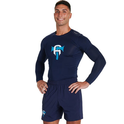 Navy long sleeve compression shirt with crew neck, worn with matching shorts