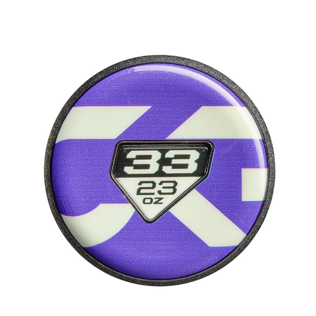 Fastpitch softball bat end cap showing “33” and “23 oz” on purple geometric background
