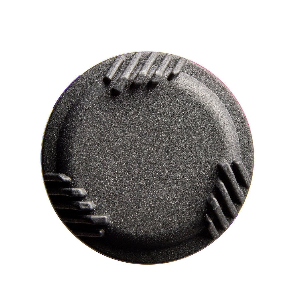 Fastpitch softball bat end cap with textured black surface and ridged edge