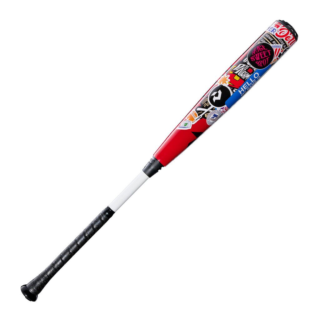 Baseball bat with sticker-bomb barrel graphics and red handle, black grip end