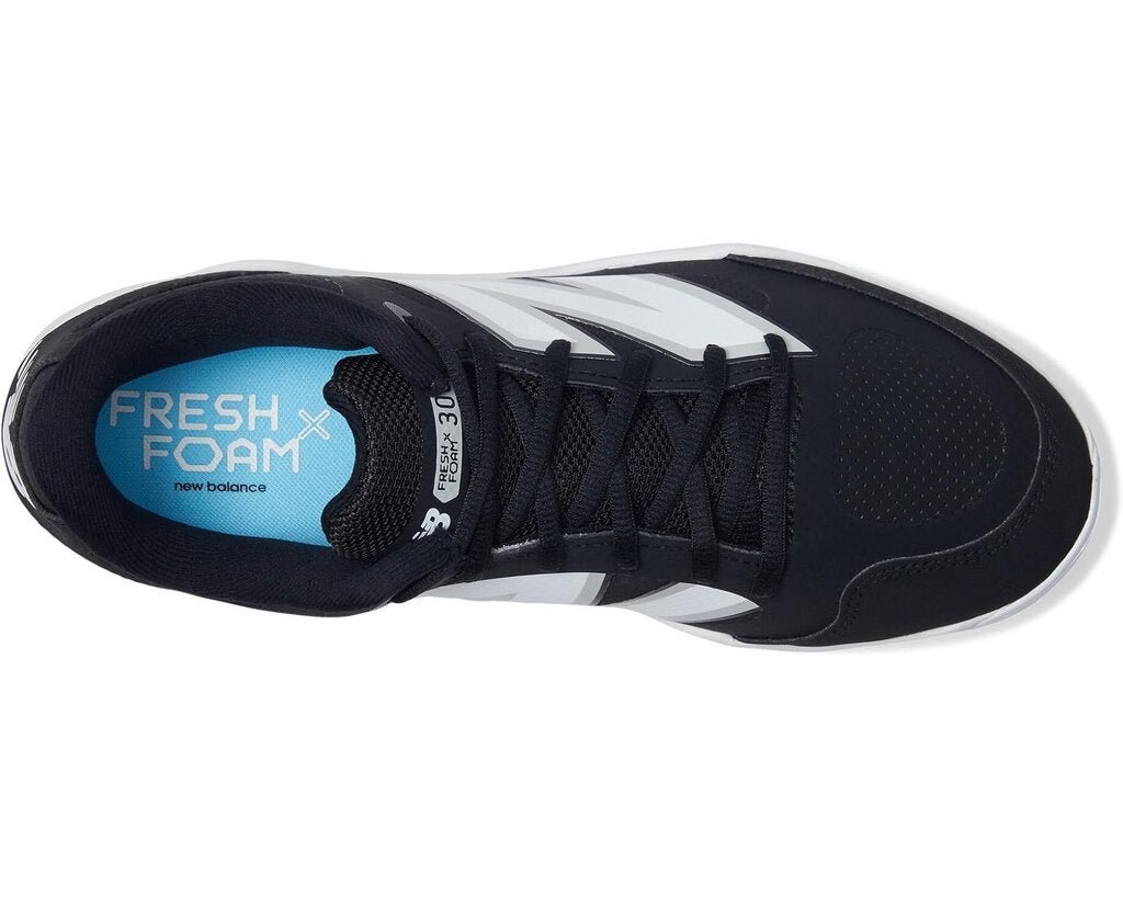 Black molded baseball cleats with Fresh Foam insole and lace-up upper