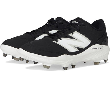 Black New Balance molded baseball cleats with lace-up front and metal studs