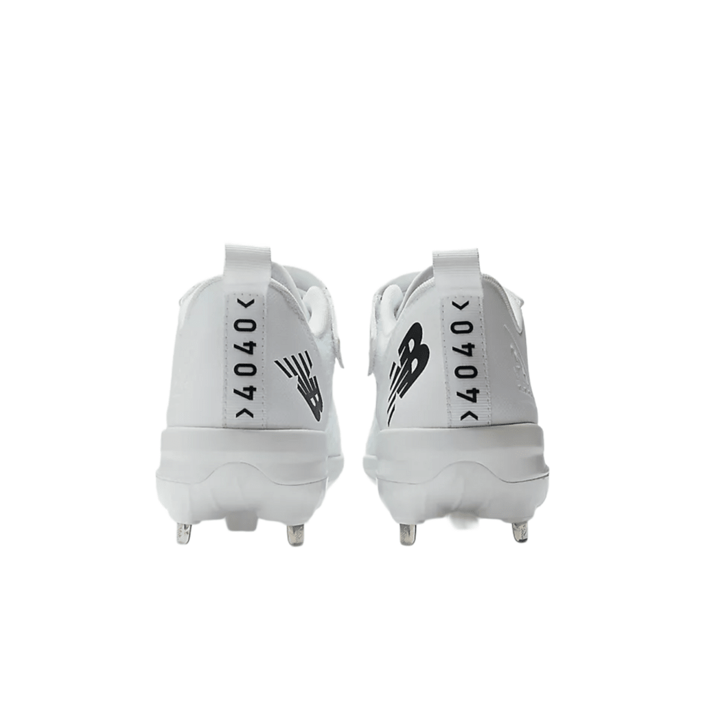 Pair of white baseball cleats from back view with metal studs and New Balance logo