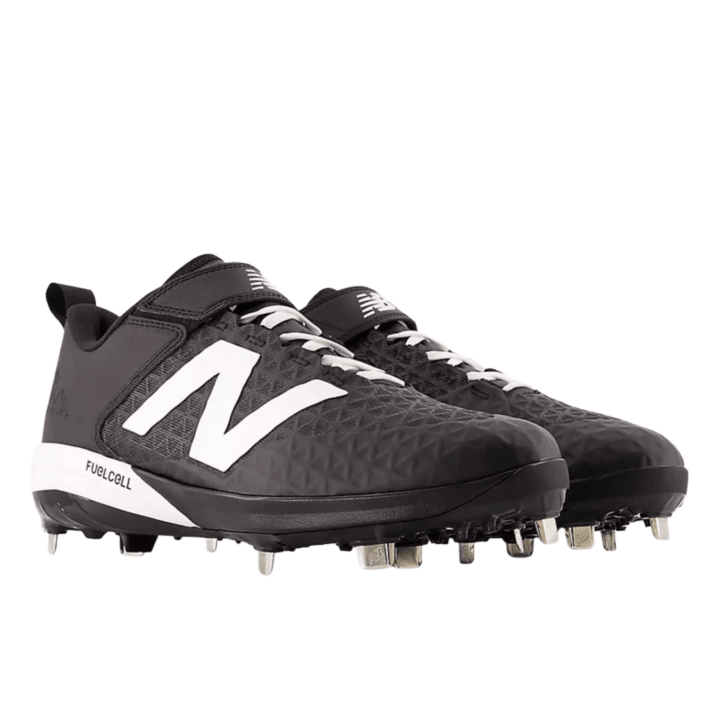 Black baseball cleats with white accents and studded outsole, lace-up closure