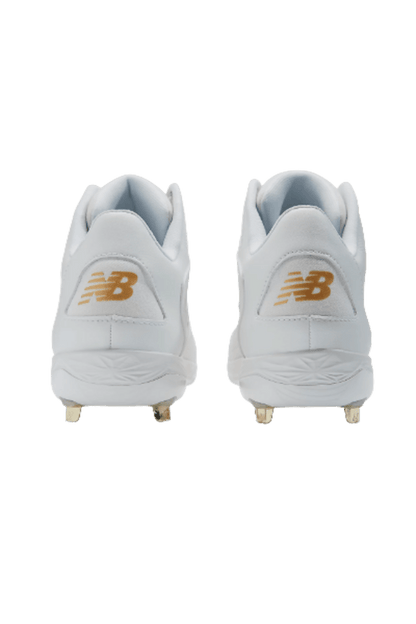Back view of white baseball cleats with gold New Balance heel markings