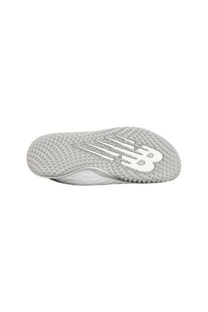 Women's turf shoe outsole, light gray textured tread with New Balance logo
