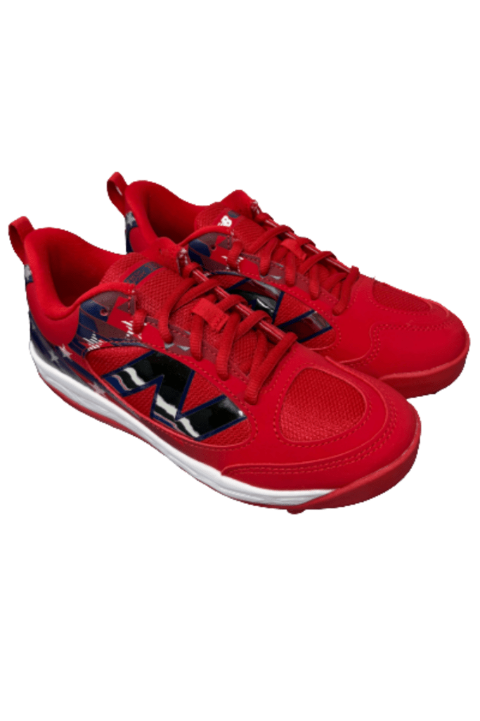 Youth molded cleats, red and navy with lace-up design and white midsole
