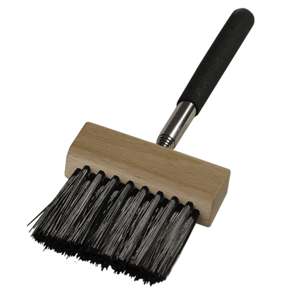 Telescopic umpire plate brush with black foam grip and wide bristle head on wood base