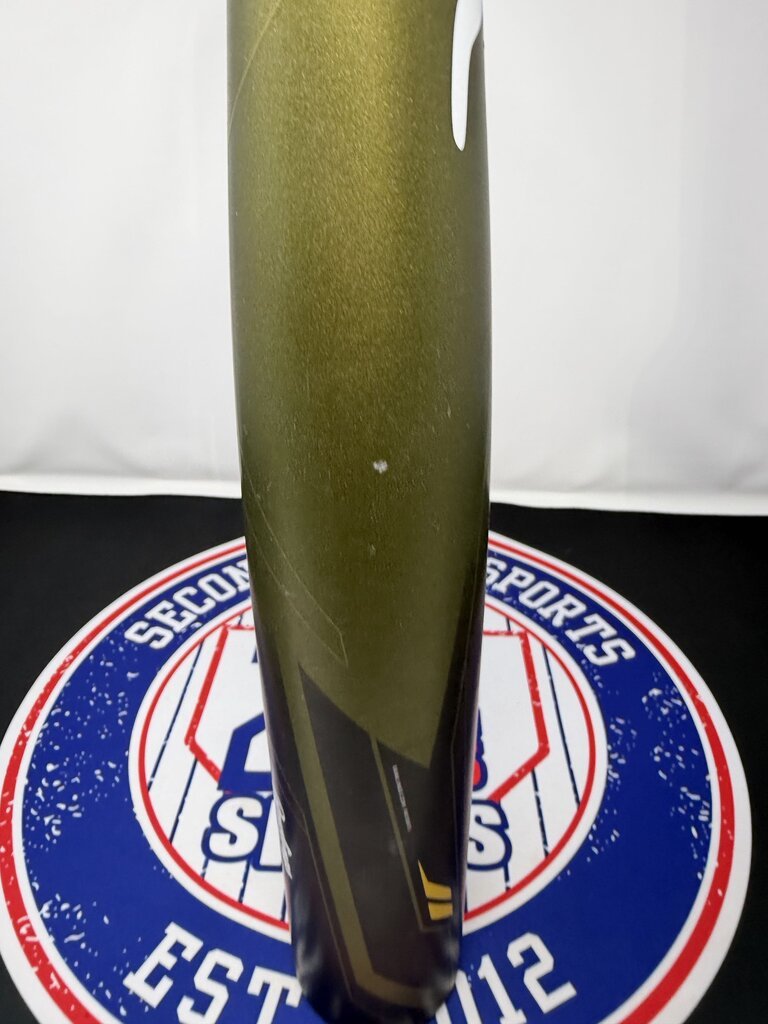 Used 32-inch baseball bat close-up of dark olive barrel and black grip end