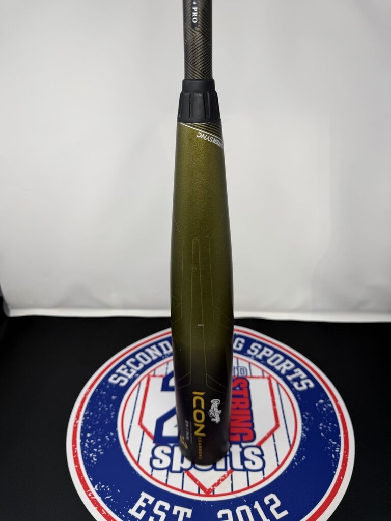 Used baseball bat with black handle end and olive barrel, side logo visible
