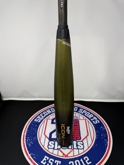 Used baseball bat with black handle end and olive barrel, side logo visible
