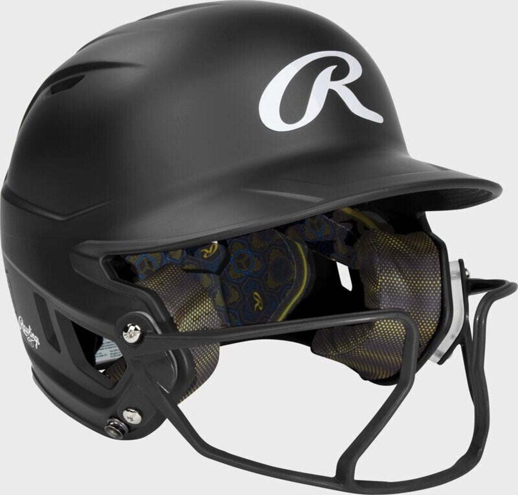 Rawlings black fastpitch batting helmet with side profile and face guard