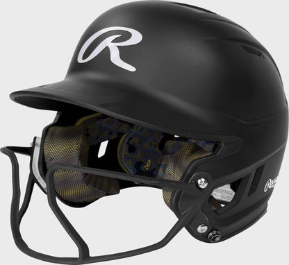 Rawlings black fastpitch batting helmet with face guard and patterned interior padding