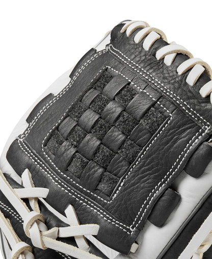 Fastpitch softball glove close-up, dark webbing pocket with tan lacing and stitched edges