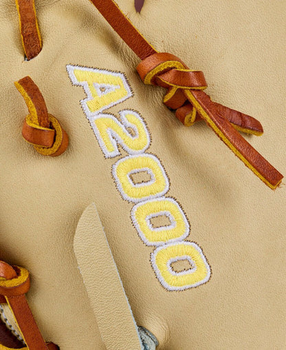 Baseball first base mitt close-up, tan leather with embroidered A2000 patch