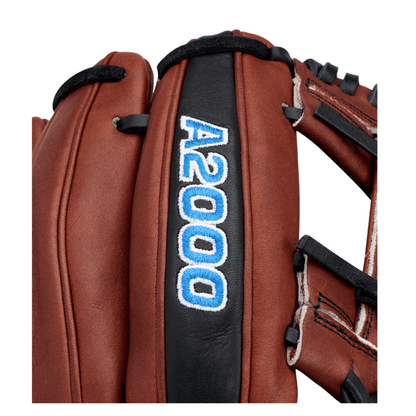 Close-up baseball glove wrist strap with black background and blue A2000 lettering