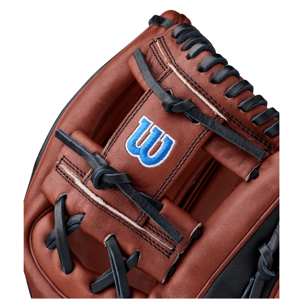Close-up reddish-brown baseball glove with black laces and blue Wilson W logo