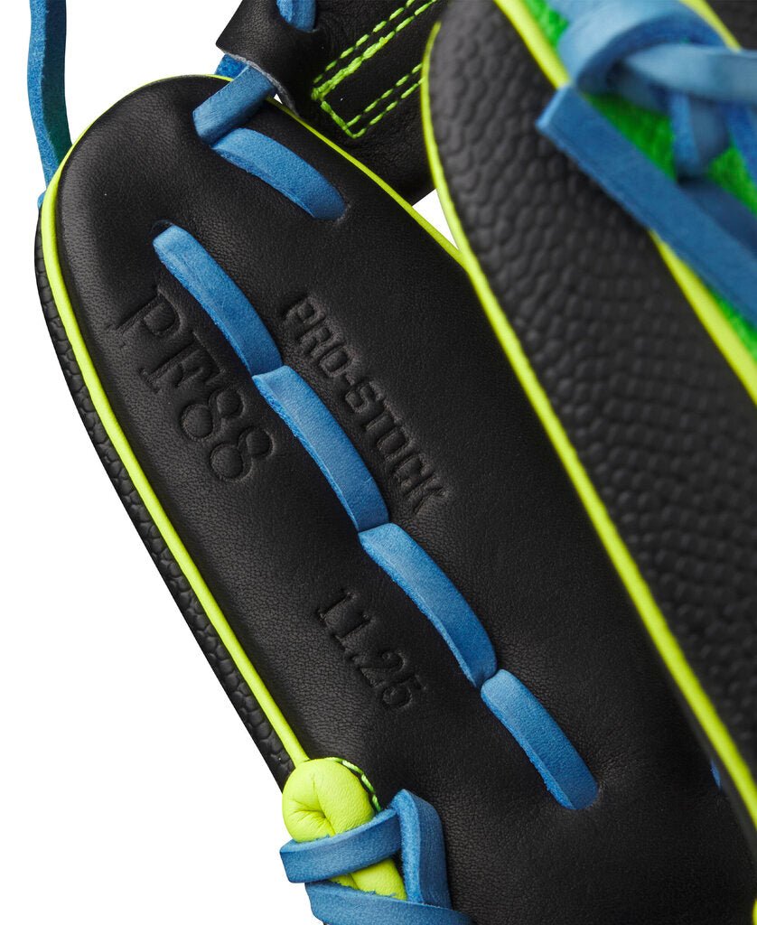 Baseball glove close-up with embossed lettering on black leather and blue trim