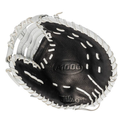 Wilson first base mitt pocket detail, black leather with white lacing and Wilson logo
