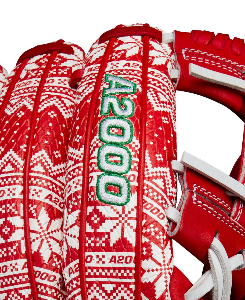 Close-up baseball glove back with red-and-white pattern and green emblem patch