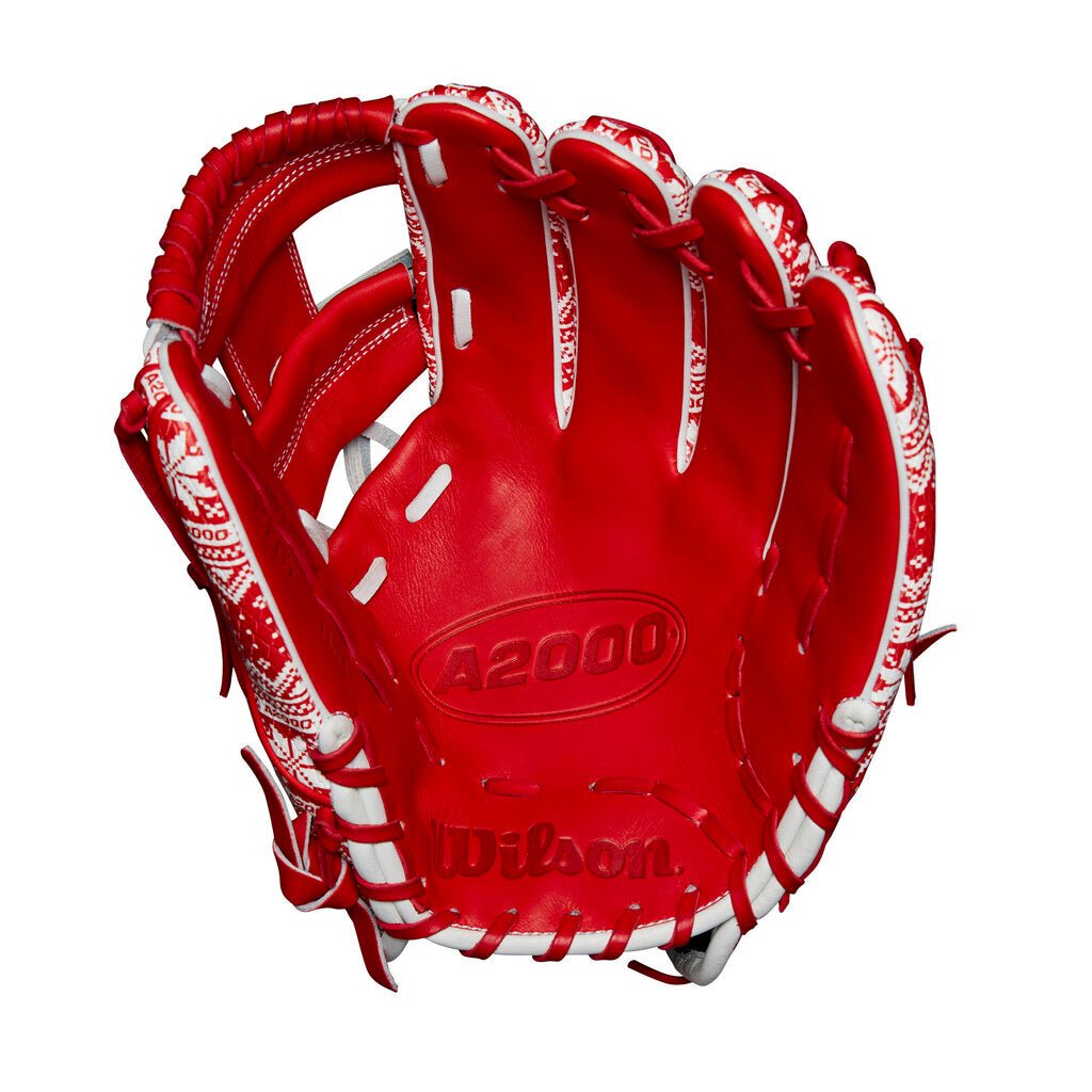 Red baseball glove with white web laces and embossed “A2000” branding on palm