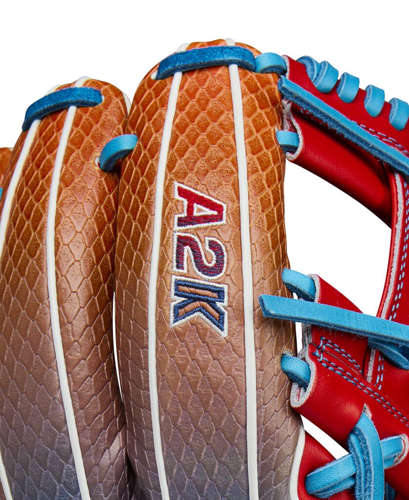 Baseball glove close-up showing A2K patch on tan back panel and blue lacing straps.